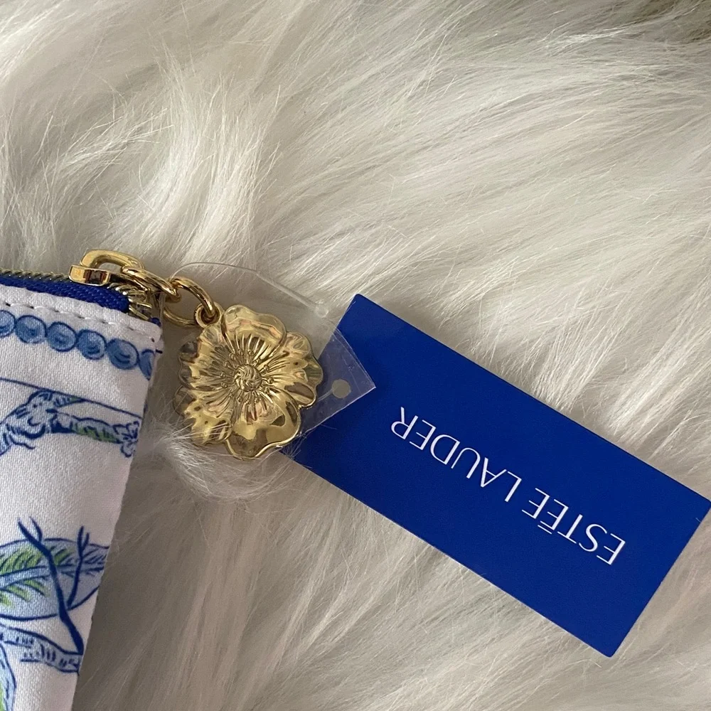 Estee Lauder White and Blue Floral Cosmetic Bag with 2 beauty products